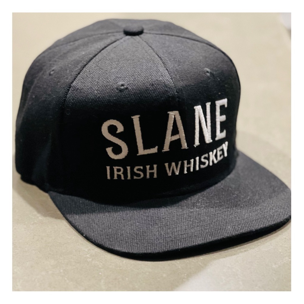 Black SLANE IRISH WHISKEY snapback hat|OSFM
